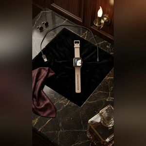 Smartwatch with Beige Strap & Charger